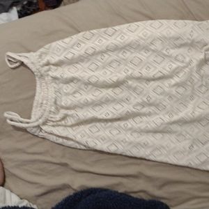 Adjustable cream colored swimsuit coverup